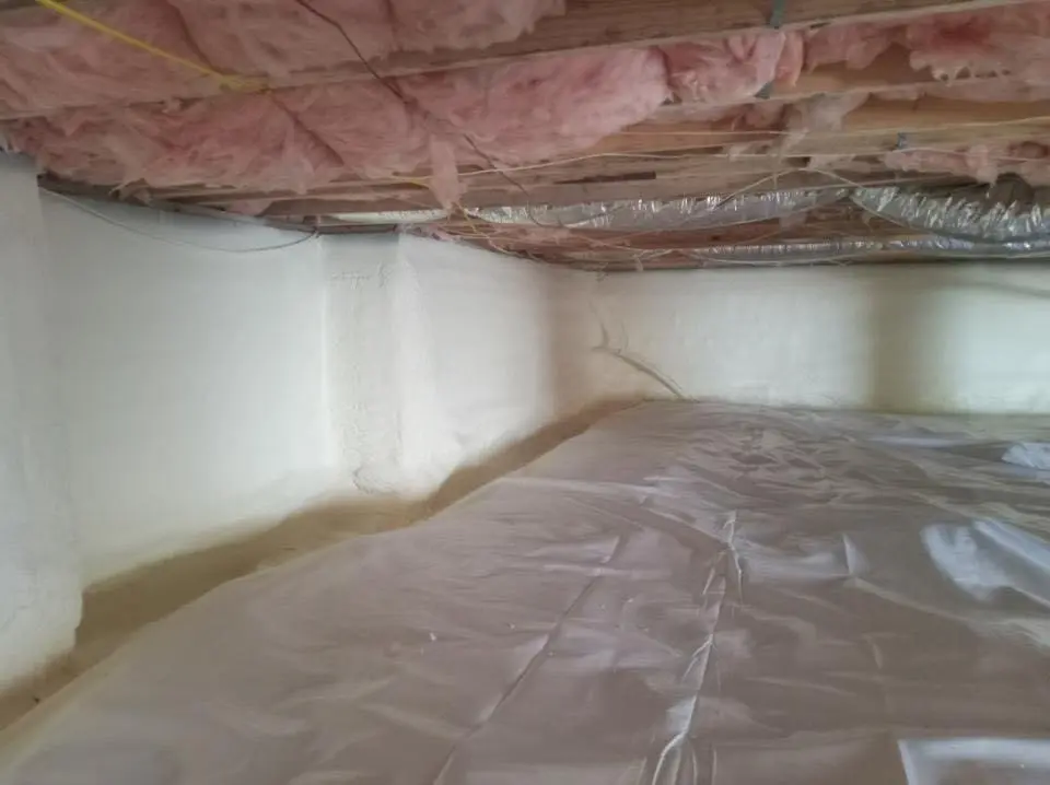 Crawl space encapsulation with closed-cell spray foam for Commercial Roof Restoration in Cumming